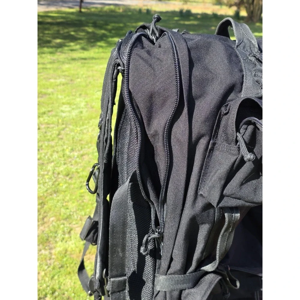 black tactical backpack is a Sandpiper of California Bugout Bag **see Pics**